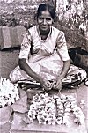 Girl Selling Flowers