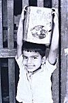 Boy Carrying Candy