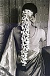 Flowers Decorating a Woman's Braid