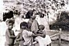 Santali Tribal Woman and her Three Children