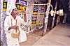 A Devotee Begging in the Name of God with a Long Horn