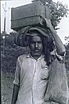 A Devotee Walking to Nagadwara for the Snake Festival