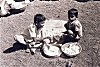 Boys Selling Ash Balls (Vibhuti)