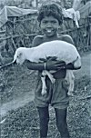 A Girl Belonging to the Santhal Tribe and her Pet