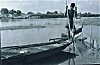 Man operating hand powered boat