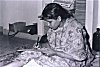 A Housewife Writing Letter to Husband