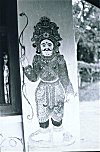 A Painted Doorman outside a Temple