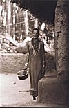 Halakki  Woman in front of her Habitat