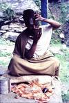 A Sadhu Puts on Holy Make-up !