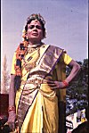 A Male Folk Artist Dressed as a Queen