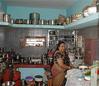 Indian Housewife in her Kitchen