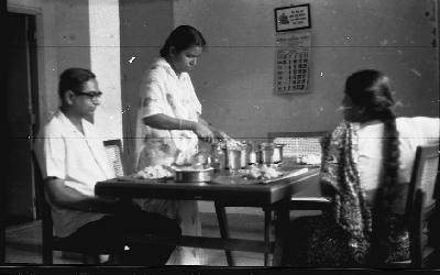 Mr. and Mrs. Bhaktamitran at breakfast table